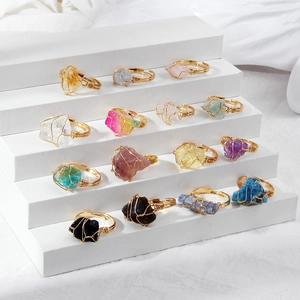 Set of 12 handmade wire wrapped rings with irregular natural crystals and gold bands