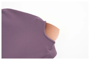 Detail showing removable bra pads and high-elastic purple knit fabric of yoga set