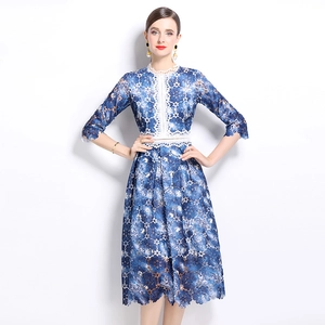 Elegant navy blue floral lace dress with white crochet trims and mid-length sleeves