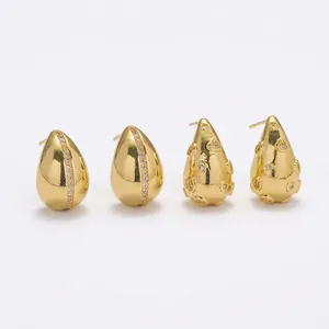 Elegant gold drop earrings with heart shape settings and sparkling zircon crystals