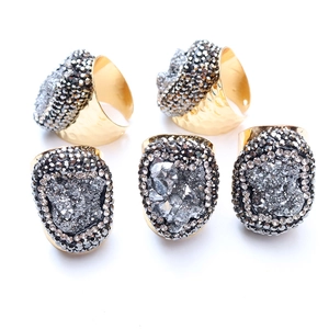 Detailed set of 5 bohemian open rings featuring raw druzy stones and hammered gold plating