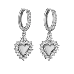 Detailed view of silver heart earrings with micro-pave diamonds and crown design