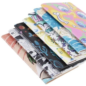 Stack of colorful printed PU leather passport covers in various artistic patterns