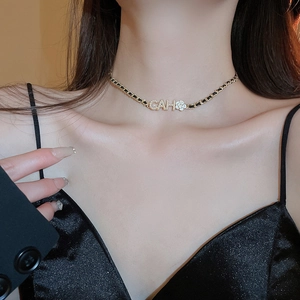 Elegant woven black leather and gold chain choker necklace with zircon CAH pendant