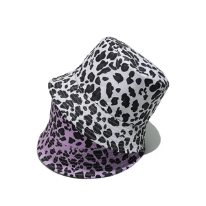 Stylish leopard print bucket hats in purple and white, ideal for summer sun protection