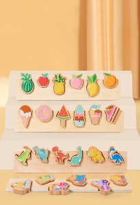 Detail view of 4 wooden peg puzzles featuring fruits, desserts, dinosaurs and vehicles