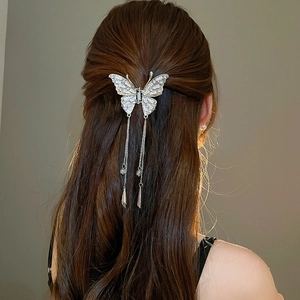 Elegant silver butterfly hair claw with tassel and sparkling crystals for women hairstyles