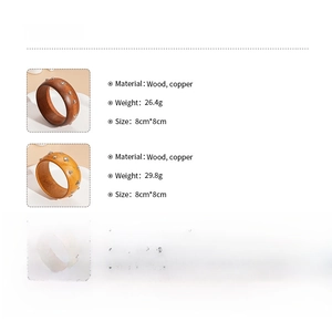 Detail showing vintage wood bangle with copper star rivets and product dimensions