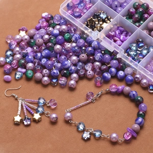 DIY jewelry kit with purple gradient glass beads, earrings and bracelets in storage box