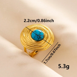 Adjustable 304 stainless steel ring with turquoise stone inlay on white fabric