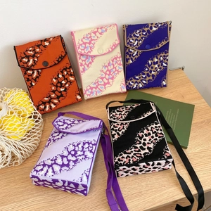 Knitted leopard print mini crossbody phone bags in five assorted colors with snap closure