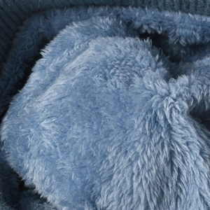 Thick light blue faux fur lining detail for thermal winter knitted pom pom beanie