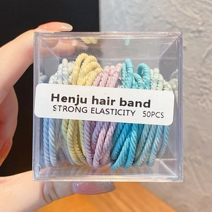 Détail de 50 élastiques à cheveux haute élasticité aux couleurs macaron en boîte