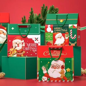 Christmas paper gift bags with handles in festive red and green featuring Santa patterns