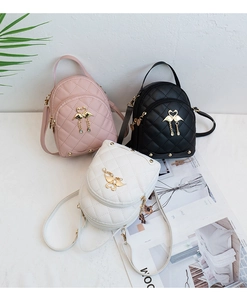 Detailed display of mini quilted PU leather backpacks in pink, black, and white colors