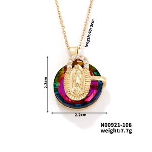 Detail of gold-plated pendant with Virgin Mary icon and colorful crystals on 45cm chain