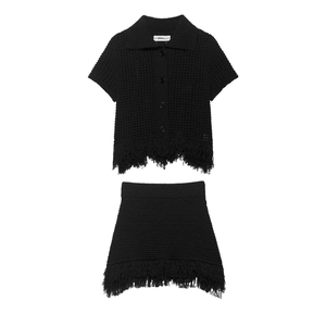Ensemble deux pièces noir en maille pour femme avec bordures à franges et col polo