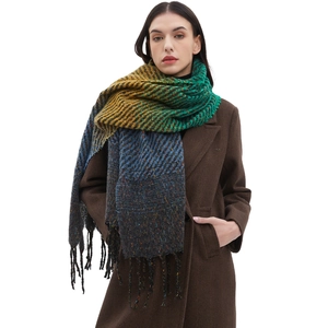 Women's multicolored striped woven scarf with tassels in yellow, green, and blue hues