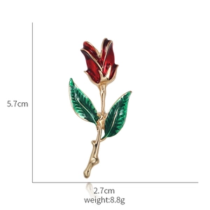 Detailed view of red rose brooch dimensions: 5.7cm height, 2.7cm width, 8.8g weight