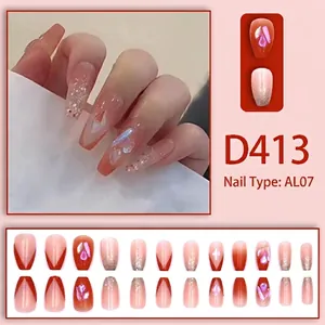 Long almond press-on nails with pink gradient, red French tips and glitter rhinestones
