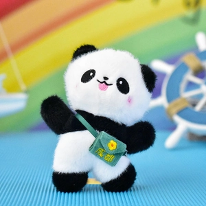 Detailed macro shot of a cute plush panda pendant featuring a tiny green Chengdu bag.