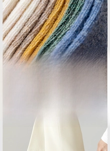 Close-up of high-elasticity ribbed cuffs on vintage solid cotton knit crew socks