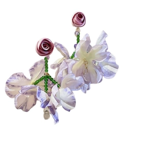 Elegant purple fabric flower earrings with green beads and silver pins for beach vacation
