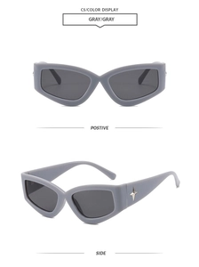 Detail view of grey Y2K cat eye sunglasses with silver star decoration on the temples
