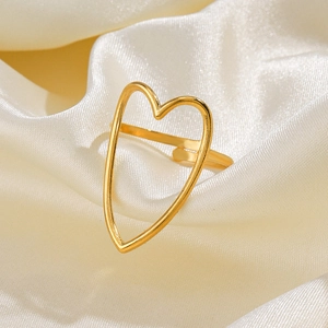 Adjustable golden stainless steel open ring with oversized hollow heart design on silk