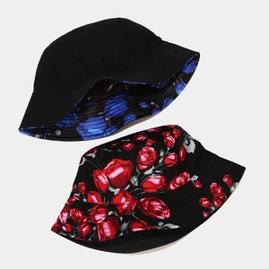 Reversible bucket hat with blue and red rose patterns made of durable cotton fabric
