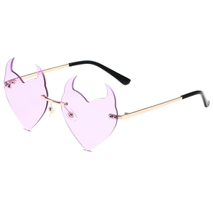 Frameless heart devil horn sunglasses with purple lenses and gold metal frame for party wear