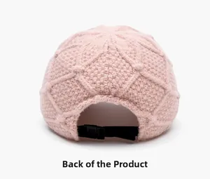 Rear view detail of the pink knit baseball cap showing adjustable buckle strap