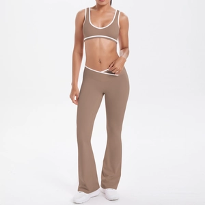 Detail view of mocha yoga set featuring white contrast binding and V-shaped cross waistband