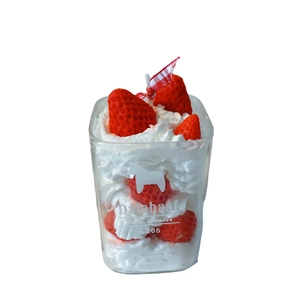 Creative strawberry cake scented candle in glass jar with elegant checkered ribbon bow
