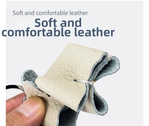 Close-up of soft creamy white genuine leather texture with natural litchi grain detail