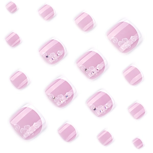 Pink French pedicure press-on nails with white tips and floral rhinestone details