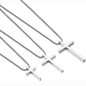 Three sizes of polished silver stainless steel cross pendants with box chains on white background