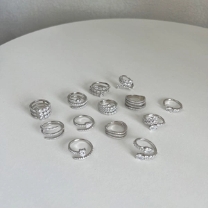 Collection of S925 sterling silver rings with multi-layer heart and snake zircon designs