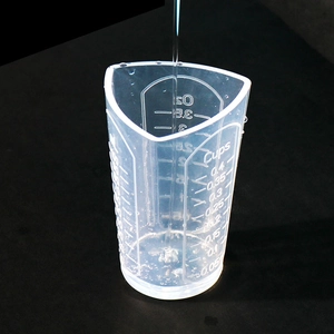 Transparent triangular measuring cup with Oz Cups and ML scales for epoxy resin