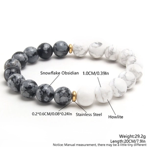 10mm snowflake obsidian and white turquoise beaded stretch bracelet with gold steel spacers