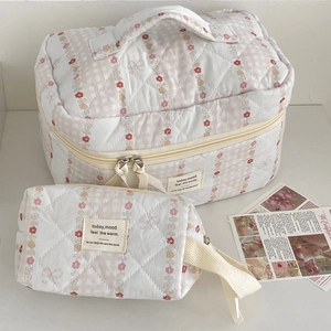 Floral cotton quilted makeup bag set with top handle and striped flower pattern