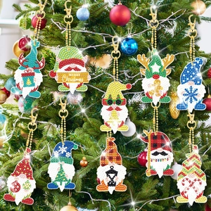 Set of 9 DIY 5D Christmas gnome diamond painting keychains hanging on a festive tree