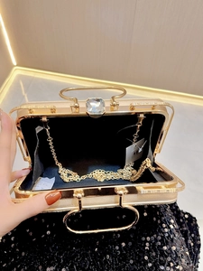 Sparkling gold evening clutch bag with crystal clasp and detachable metal chain strap