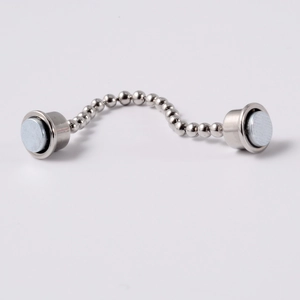Detail of silver magnetic metal bead chain with cylindrical clasps for nose rings
