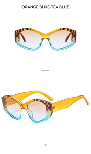 Detailed front and side view of cat-eye sunglasses with tortoise top and gradient lenses