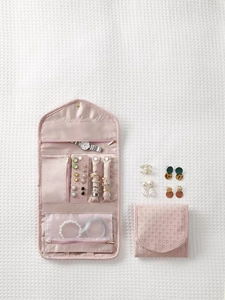 Bolsa de joyería impermeable de PU rosa con múltiples compartimentos para anillos y collares.
