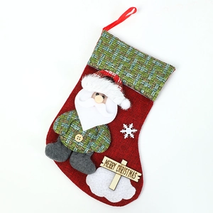 Linen Christmas stocking with 3D Santa Claus and Merry Christmas wooden tag