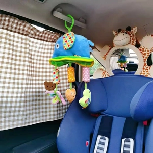 Blue elephant plush travel toy for car seats with hanging bear and bird figures