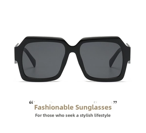 Detail view of bold square black frames with dark grey lenses for oversized fashion look