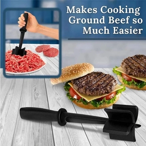 Nylon meat chopper tool used to mash ground beef and potatoes on wooden surface